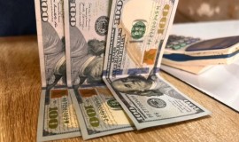 انخفاض محدود بسعر صرف الدولار في الأسواق المحلية